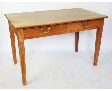 An early 20th century Cotswold type oak side table, with two drawers, on tapered legs, 76cm H x 122cm W x 68cm D    CONDITION