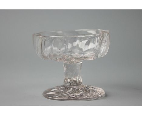 An 18th century English glass patch stand, of wrythen moulded pedestal form, 5.5cm high   CONDITION REPORT:  Un-polished pont