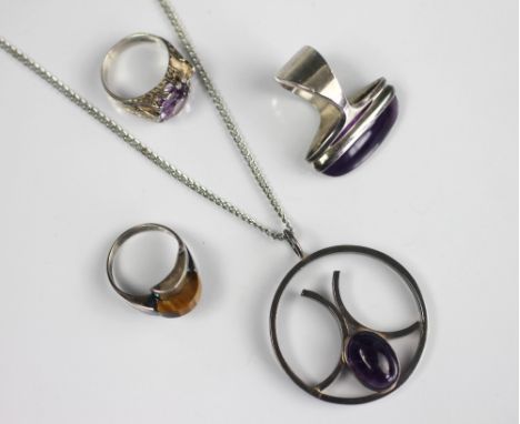 A collection of Modernist jewellery, to include; a Finnish silver and amethyst cabochon set ring, makers mark 'NB', size N, a