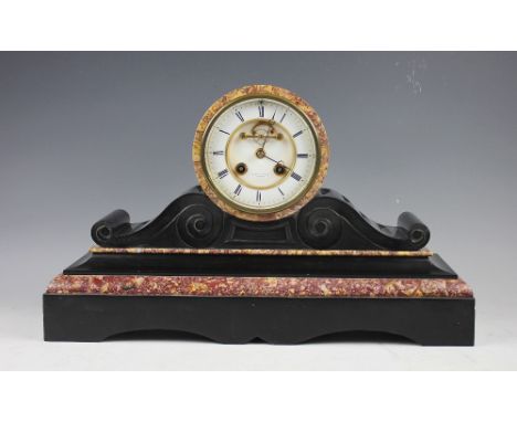A late 19th century marble mantel clock, with Roman numeral chapter ring and dial with visible escapement and signed Richard 