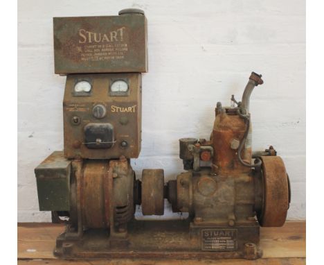 A Stuart Turner 300 watt boat engine, No 33797, with brass makers plate, 70cm, with a Stuart petrol tin (2) (Not tested - sol