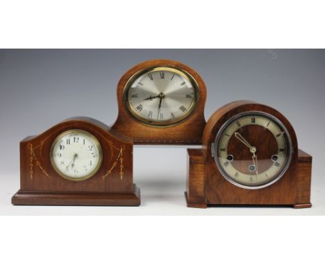 An Edwardian inlaid mahogany eight day mantel time piece, with a late Art Deco walnut mantel clock with Westminster chime and