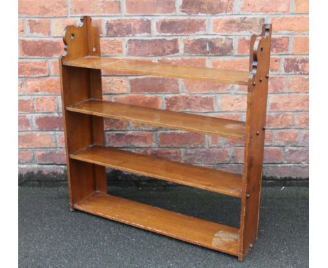 A Victorian walnut hanging shelf, with serpentine side panels, 84cm H x 81cm W