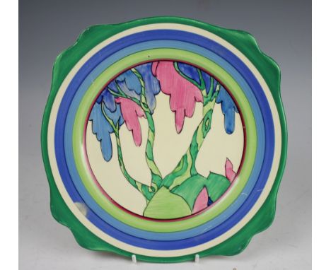 A selection of collectors items comprising; a Clarice Cliff Fantasque Bizarre living landscape plate, 23cm wide, two Royal We