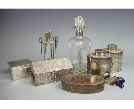 A selection of silver and white metal items to include; an Eastern white metal casket stamped 'Silver', 17cm wide, a pair of 