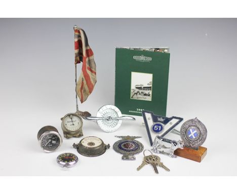 A collection of automobilia, to include; a Smiths dashboard time piece, a Smiths temperature gauge, a volt meter, a Royal Sco