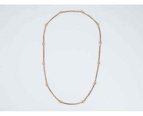 COLLIER Gelbgold. L. ca. 82 cm, Ges.-Gew. ca. 27,7 g. Geprüft 18 K. Endlos-Kette mit 24 Brillanten, D. jeweils ca. 3,7 mm, Hö