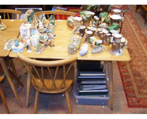 A vintage mid century Blonde Ercol breakfast table with shelf below and two Ercol Model 376 Candlestick dining chairs 