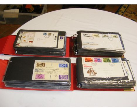 Four albums containing collectable First Day Covers, various subjects