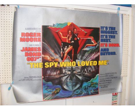 A vintage James Bond 'The Spy Who Loved Me' quad film poster - starring Roger Moore (stuck down on canvas)  CONDITION REPORT 