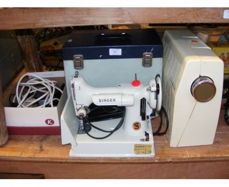 A vintage Singer 221K white sewing machine - with original box, together with a Frister Rossmann sewing machine and accessori