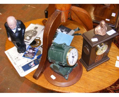 A scratch built model of a British Anti-Aircraft Searchlight, finished as a clock, together with assorted Winston Churchill i