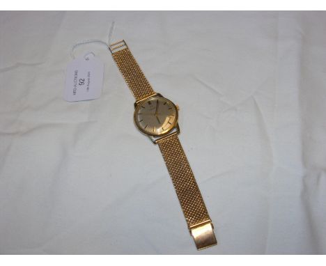 A gents 9ct gold vintage Omega wrist watch and strap  CONDITION REPORT Strap marked 375Gross weight 54.7g
