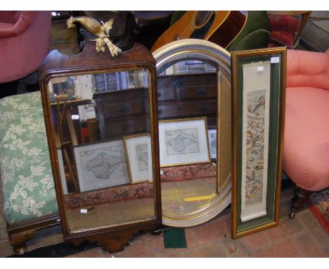 A gilt framed oval wall mirror, one other mirror and a framed and glazed embroidered Chinese silk scroll