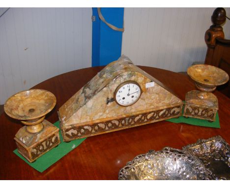 A French marble mantel clock with the matching garnitures - the clock 55cms wide