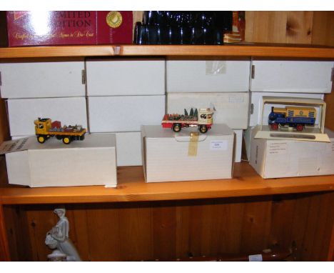 Assorted die cast model vehicles - on two shelves 