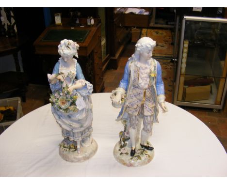 A pair of impressive Meissen style antique ceramic figures of man and woman, having mark to base - 50cm high