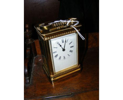 A brass cased carriage clock - 12cms high