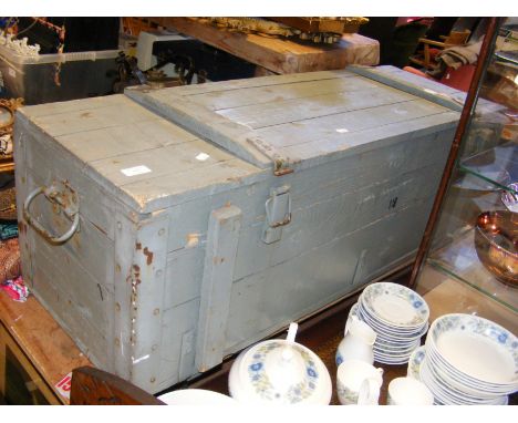 A large wooden crate/ammunition box  