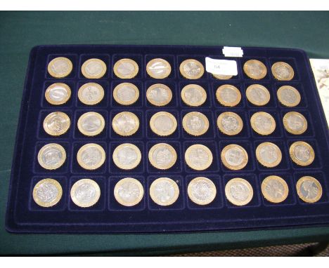 A collection of UK £2 coins, including The First World War 1914-1918 - dated 2015 