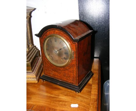 A small burr walnut mantel clock - 26cms high