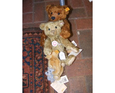 Four Steiff teddy bears of varying size