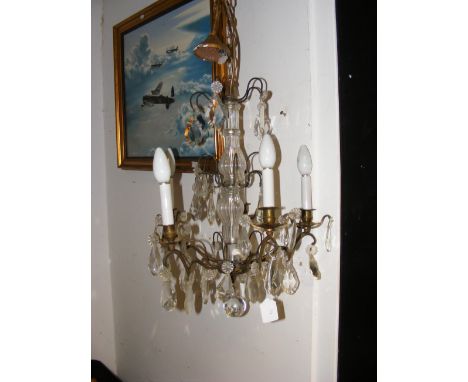 A five branch crystal drop ceiling light
