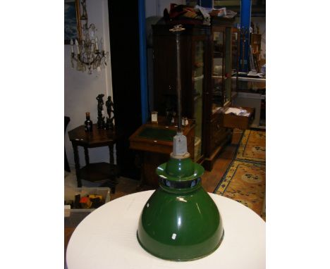 An industrial green enamel ceiling light