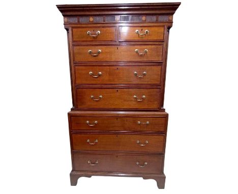 Georgian oak and fruitwood crossbanded chest on chest, with moulded cornice and patera inlaid reeded frieze, having two short