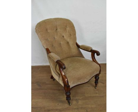 George IV mahogany open armchair, button upholstered back and overscroll arms, raised on turned legs and castors