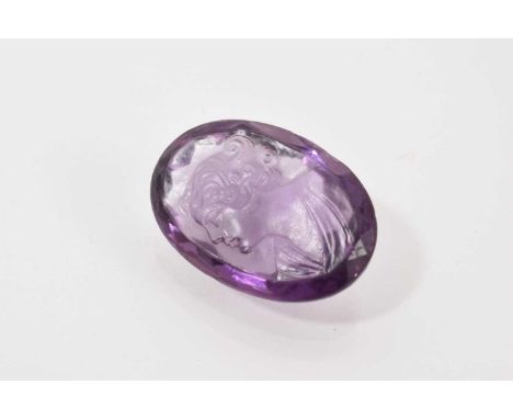 Antique cameo carved amethyst, the oval faceted stone with cameo carved female portrait bust, 26 x 19mm.
