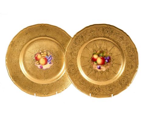 Pair of Royal Worcester hand painted fruit plates, on gilt-tooled ground, scalloped edges, stamped marks to bases, 27.5cm dia