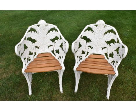 Pair of cast iron garden chairs, bowed form and in fern pattern, probably by Goss and Peene. Rayne Foundry Essex, refurbished