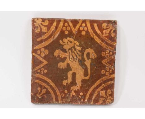 Medieval encaustic tile, decorated with a rampant lion, 14.5cm sqaureGood overall antique condition with chips and glaze wear