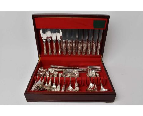 Mahogany Canteen, containing a comprehensive selection of matching contemporary silver Kings pattern with diamond heel cutler