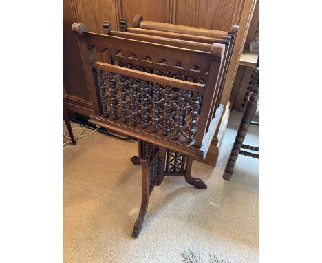 Liberty style Moorish revival revolving Canterbury with typical bobbin fret panels, revolving on tripod base, 78cm high