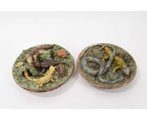 Near pair of Portuguese Palissy ware dishes, decorated with lizards, snakes, and other reptiles, one marked M. Mafra Caldas, 