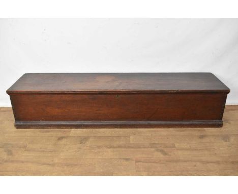 19th century oak narrow trunk, with pierced end handles, 158cm wide x 37cm deep x 33cm high 