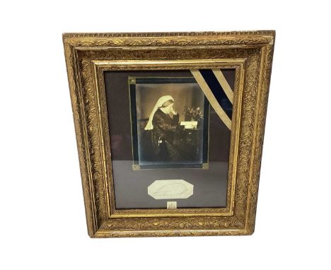 H.M. Queen Victoria signature and portrait photograph of the Queen mounted in glazed gilt frame, 46 x 39cm