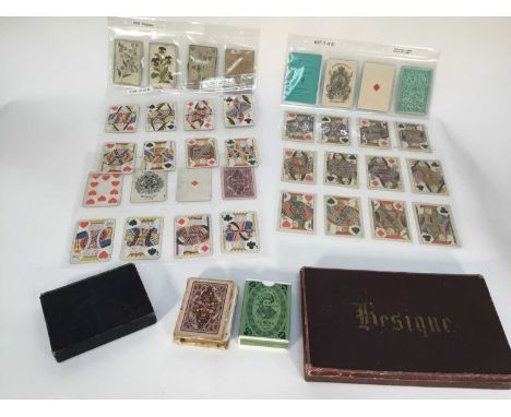 Group of Victorian playing cards including full 52 card deck by Woolley &amp; Co, c1890, with gilt edges and details of stati