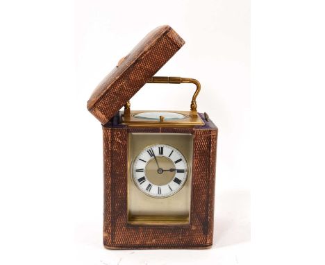 Late 19th century French carriage clock with repeating movement, white metal and enamel dial in brass case, 17cm high in orig