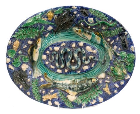 Large 19th century French Palissy style majolica oval dish, decorated in relief with a snake, fish, frog, crayfish, shells, a