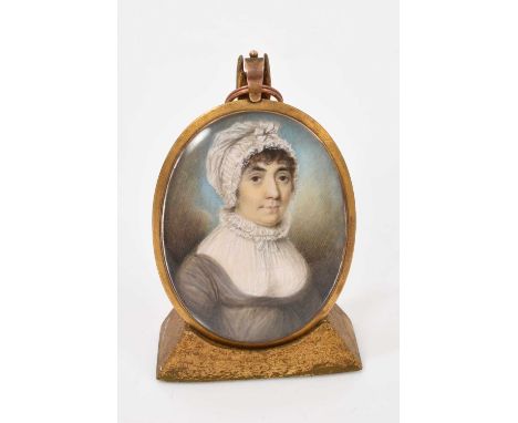 Attributed to William Grimaldi (1751-1830), portrait miniature on ivory depicting a woman with bonnet, oval, 6 x 5cm, in glaz