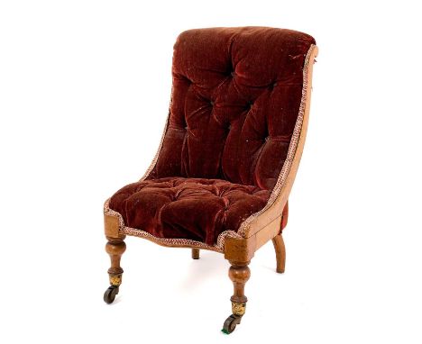 Mid Victorian child's spoon back chair, button velvet upholstered on walnut frame with brass cappings and castors, stamped CO