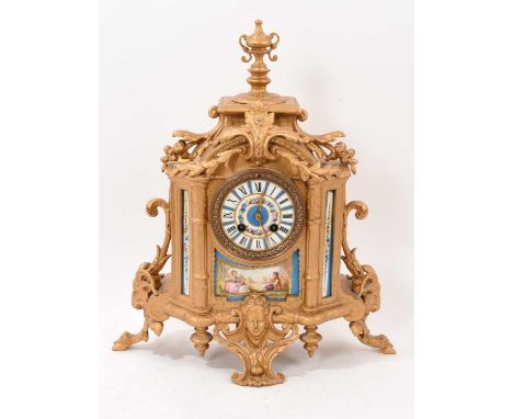 Late 19th century French porcelain and gilt metal clock with painted figure and floral decoration, 42cm high with key