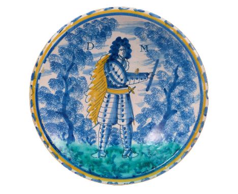 A rare English delft ware Duke of Marlborough charger, probably Bristol, circa 1710, decorated with a full length portrait of