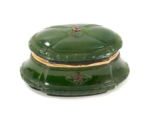 Fabergé style French nephrite jade box, of cushioned form, with gold mounts and inset rubies, marked for 18ct gold, 7cm wideO