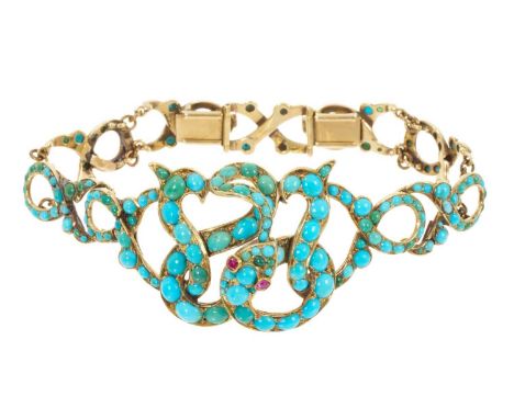 Victorian gold and turquoise snake bracelet, the coiled gold snake with ruby eyes and turquoise cabochons with graduated arti