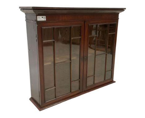 19th century mahogany bookcase top, projecting cornice over two astragal glazed door, fitted with adjustable shelf Dimensions