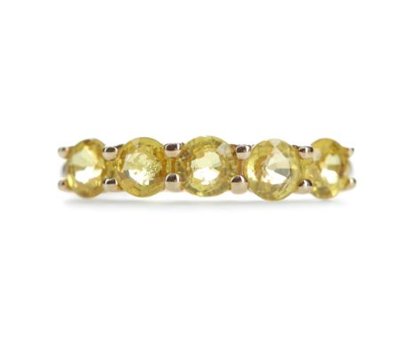 YELLOW SAPPHIRE RING, set with five round yellow sapphires, marked 9K, size O, 2g